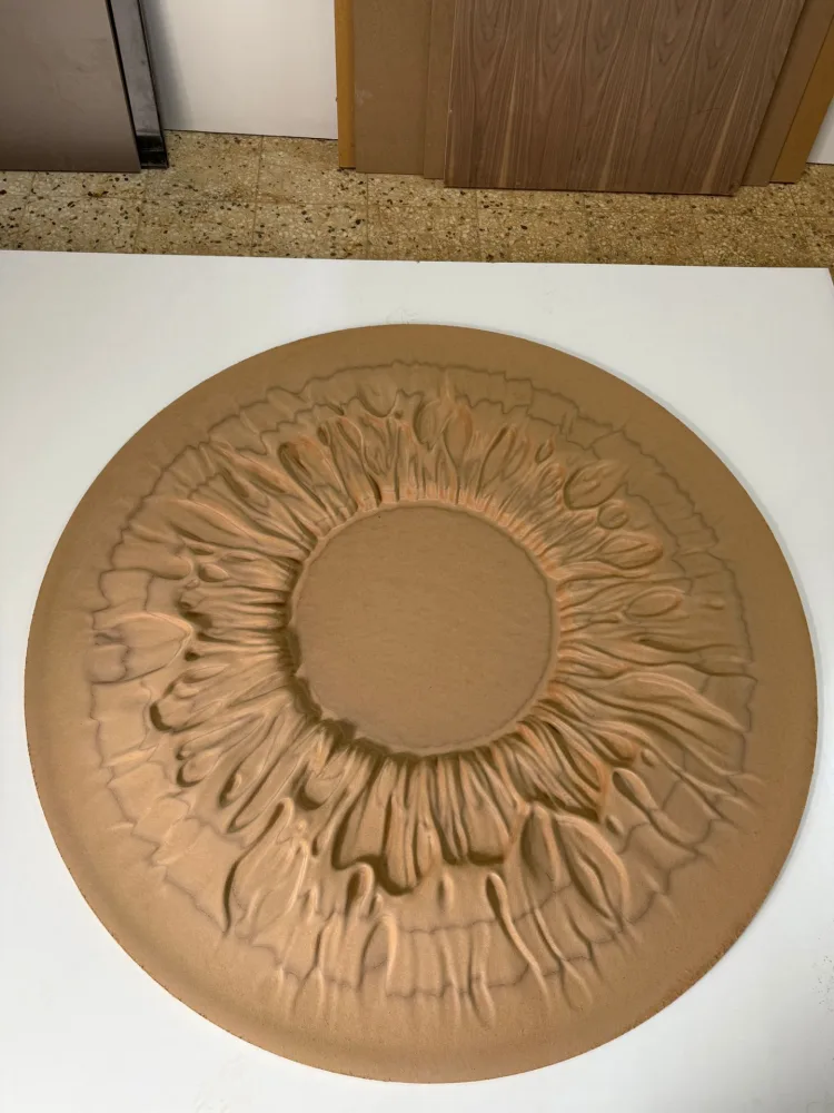 Flower relief displayed on a wall