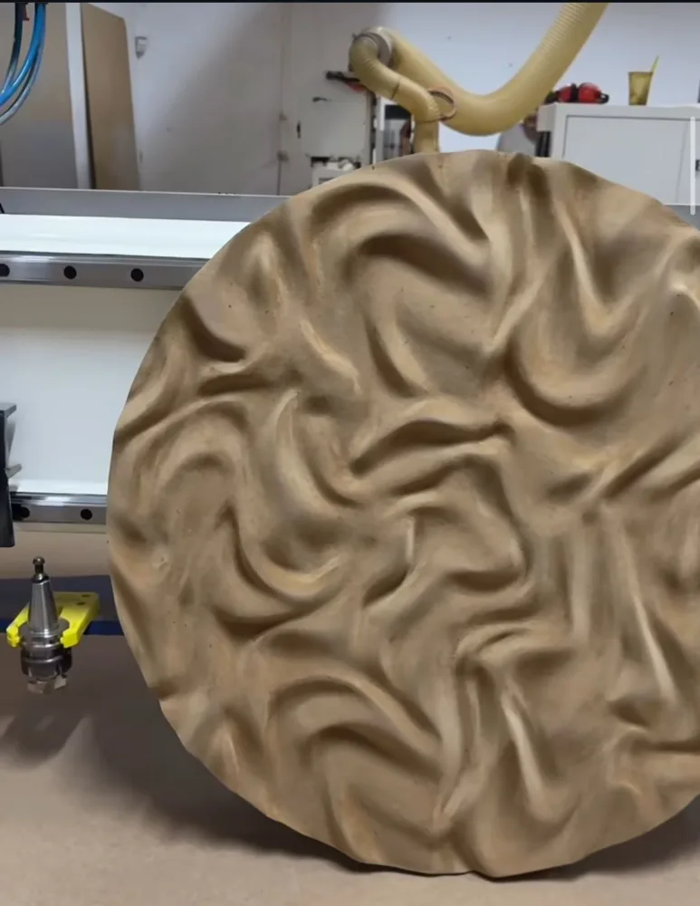 Circular relief with a dense wave pattern