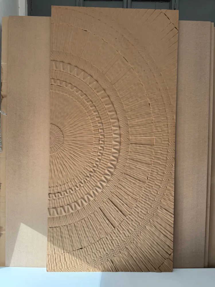 Panel with a geometric semicircle pattern