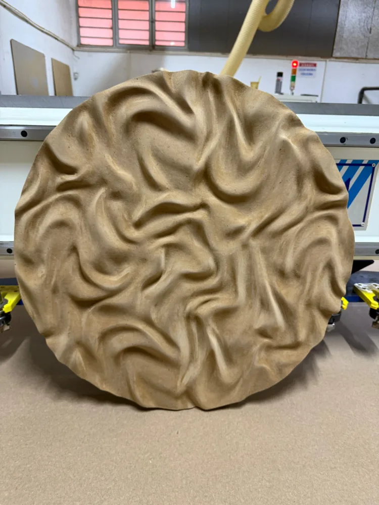 Circular relief with an organic surface pattern