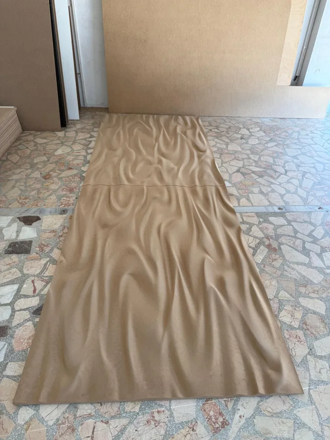 Dalga dokulu uzun panel