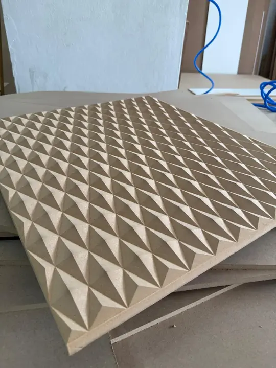 Geometric panel with triangular surfaces